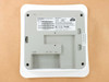 Pakedge WK-1 — bottom label detail showing model, serial number, MAC addresses, default settings, FCC ID SLY-WK1X22, and Made in China