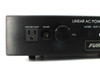 Furman ELITE-15 PF front panel close-up — left side showing switched outlet and dimmer pull-knob