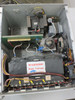 Interior top view of Sloan Five/Ten power supply showing transformer, wiring, and high-voltage warning sticker