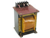 Open frame laminated core power transformer with copper windings and screw terminal block — front-left angled view