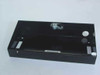 Control Module CMI 2062-001 SaveTime Base — top-down view showing metal latch clip and mounting holes