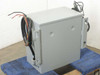 Hevi-Duty HT1F9AS transformer — rear view showing gray enclosure, output lead wires, and mounting flanges on right side