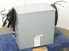 Hevi-Duty HT1F9AS 9KVA dry-type transformer — front view showing gray enclosure, rating label, and lead wires exiting left side