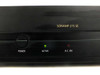 Close-up of Sonance SONAMP 275 SE front panel showing recessed Power knob, lit Active (green) and A.C. On (red) LEDs, and gold model name lettering