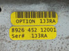 Yellow barcode labels showing Option 1J3RA and factory number 8926 452 12001 with serial number 1J3RA for the Triax Trilock module