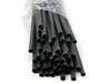 Close-up of black 3M EPS-300 dual-wall heat shrink tubing ends showing hollow cross-section