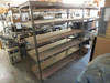 Boltless rivet shelving units in warehouse environment — shows scale and typical in-use storage configuration