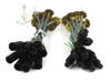 Two bundles of MC3 solar cables side by side — close view of black MC3 female connector ends and brass terminal ends