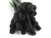 Close-up of black MC3 female connector ends on solar cables — recessed socket contacts visible