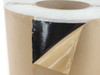Royal PVA-600BT butyl tape close-up showing black adhesive layer with kraft paper release liner being peeled back