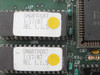 Close-up of two ROM chip labels on Arnet Smartport board reading 'SMARTPORT 1/17/87 REL 1.1.5'