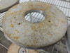 Top view of a 16-inch Lapmaster lapping plate showing heavy surface rust and oxidation with center bore