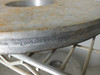 Edge/rim view of a Lapmaster lapping plate showing stamped part number 8013226338-07-10 (or similar) on the rim