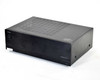 Integra ADM-2.1 stereo power amplifier — front left three-quarter view showing WRAT badge and model designation on black chassis