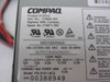 Compaq 173609-001 power supply rating label showing part number, spare number, model PS-6151-6C2, 100-240V input, 145W max output, and voltage/amperage specs