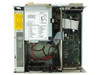NEC PowerMate 286 Plus internal view — system board component side with PowerMate 286 Plus switch settings label, TDK power supply, and ribbon cables visible