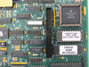 Kronos 6600186-999 board closeup showing Motorola MC68EC000FN8 processor and firmware ROM labels 6700377-001 and 6700375-001