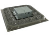 Underside of Tate CCN1250 ConCore 1250 floor tile, angled view showing cementitious core pattern and steel outlet box housing