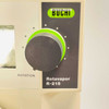 Close-up of Buchi Rotavapor R-215 rotation control knob and 'BUCHI Switzerland' label on front panel