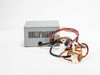 Dynapower 250W AT power supply — left side view showing ventilation slots and full wiring harness with Molex 4-pin drive connectors