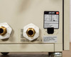 Jun-Air 2000-25M rear panel showing dual brass output ports and data label with model, PSI, voltage, and current specs