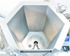 Interior top-down view of ASI imPULSE 100L stainless steel mixer vessel showing hexagonal bottom, mixing impeller/agitator blade, and port fittings