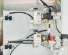 Pneumatic manifold panel showing SMC digital vacuum transducer (kPa) and SMC pressure transducer with Sirai solenoid valves and push-to-connect fittings