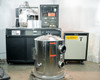 CHA Industries SEC-600 vacuum deposition system overview — bell jar in foreground on pallet, main cabinet and power unit in background