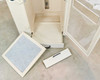 Grumbach inter-hatch incubator bottom hatch drawer removed and filter tray and front panel fascia disassembled on floor