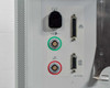 Lumenis Novus Varia side connection panel showing foot pedal connector, two DB25 parallel connectors, green-ringed and red-ringed multi-pin circular connectors, and panel label OKAD-101-01 REV A