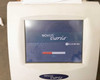 Lumenis Novus Varia touchscreen displaying boot/startup screen with Novus Varia logo and Lumenis branding and loading progress bar