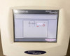 Lumenis Novus Varia touchscreen displaying connection/setup screen with slit lamp and fiber optic cable connection diagram icons