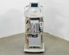 Lumenis LightSheer XC laser system – front view showing open chassis, internal boards, red emergency stop button, and touchscreen display