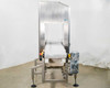 CEIA THS/MS21 metal detector — feed-end view showing white modular plastic conveyor belt entering detector aperture, stainless steel frame, and SEW drive motor on right side