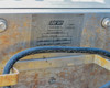Doran Scales 8000XLM model label – showing model, serial number, and calibration markings on scale head plate