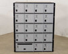 Salsbury 3620 mailbox unit front view – 5 rows of 4 doors each with spinning combination locks and mail drop slot