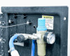 Ecolab EZBlend Foam Unit – close-up of pressure regulator assembly with gauge, caution label, blue hose connections, and filter housing