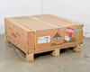 LG Chem RESU10H palletized shipping box — three-quarter rear view showing RESU branding, UN3480 Lithium Ion Batteries label, Fragile sticker, and 9.8kWh energy marking