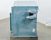 HPS NMF025LE transformer – right side panel view showing two conduit elbow hubs (primary and secondary connections) mounted on the enclosure