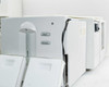 Labsphere RSA-HP-8453 side view showing Blank and Standard sample port buttons and open sample compartment doors, adjacent to HP spectrophotometer