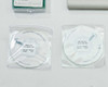 Close-up of two Labsphere Certified Reflectance Standard disks in sealed bags — SPRS-010 AS-00559-000 Serial MIR01-1227 (left) and SRS-99-010 AS-01160-060 Serial BR21A-1224 (right)