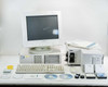 Labsphere RSA-HP-8453 complete system overview — spectrophotometer, HP Vectra PC, Hyundai monitor, keyboard, calibration standards, CDs, and accessories laid out on table