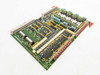 Netstal 110.240.9216A DIO Komplett PCB – angled top view showing full board layout with ICs, relay bank, and edge connectors