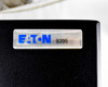 Eaton 9395 model badge close-up showing blue Eaton logo on black cabinet panel