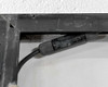 Corner detail of Yingli YL240P-29b solar panel rear frame showing second MC4-style output connector in good condition