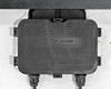 Close-up of ZJRH PV-JB1700 IP65-rated junction box on rear of Yingli YL240P-29b solar panel with dual cable exits