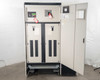 PDI Power Pak M-4 PDU — front view with main left cabinet door open, revealing internal panelboard section with red caution tags on breakers