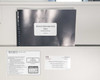 PDI Power Distribution Unit Owner's Manual (Revision 5) spiral-bound, M-4 Monitor instruction card, and PDI service information card laid on table