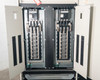 PDI Power Pak M-4 interior — full panelboard view with left and right breaker panels open, showing dual branch circuit breaker arrays and bus connections