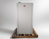 Left side of transfer switch cabinet – smooth gray panel with caution label, unit on pallet